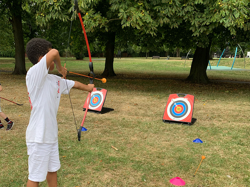 Young person taking part in soft archery